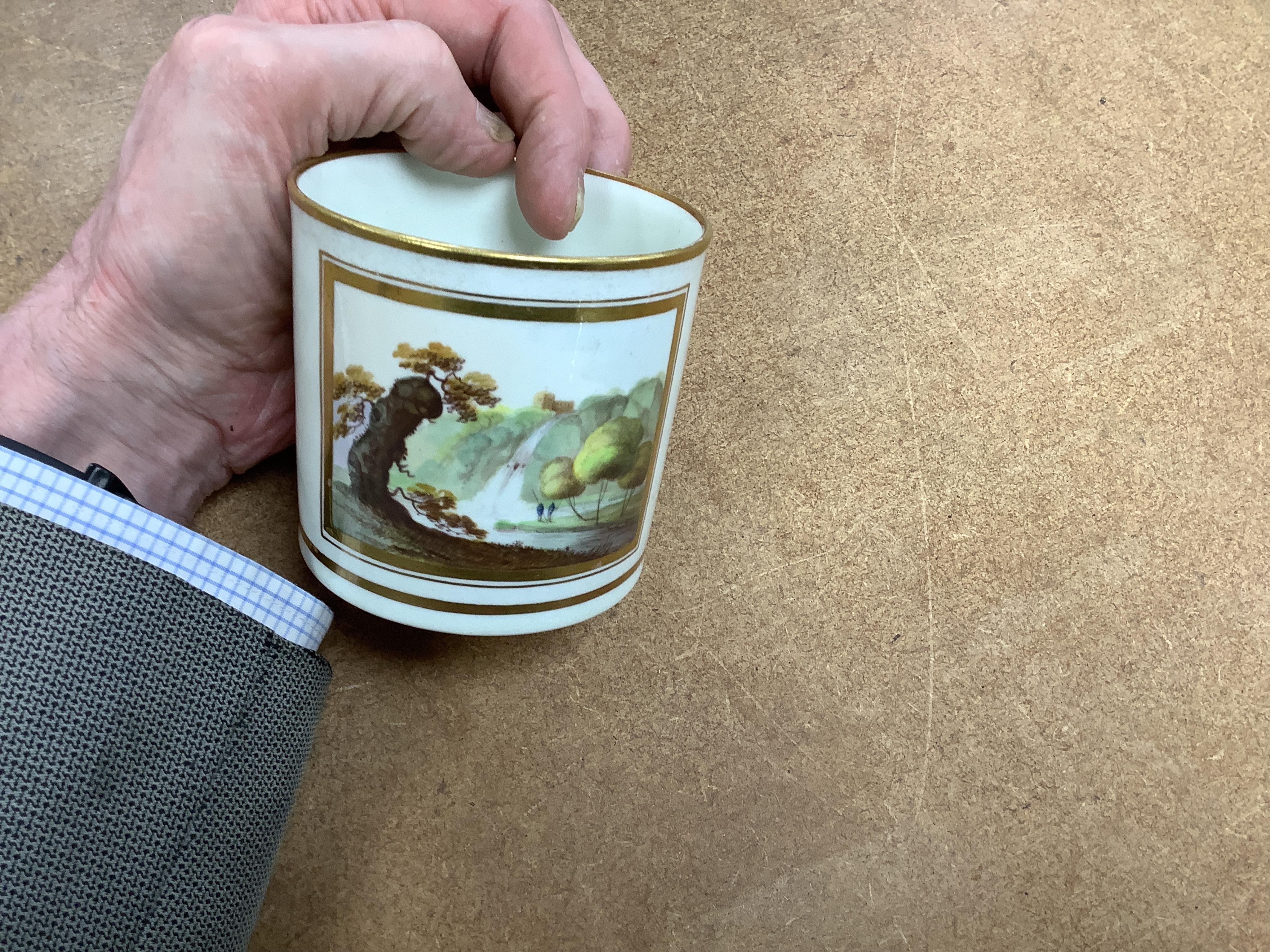A pair of early 19th century English porcelain large mugs with gilt bands and five other early 19th century porcelain or pearlware mugs, one inscribed SG, Forget Me Not, largest each 14cm high